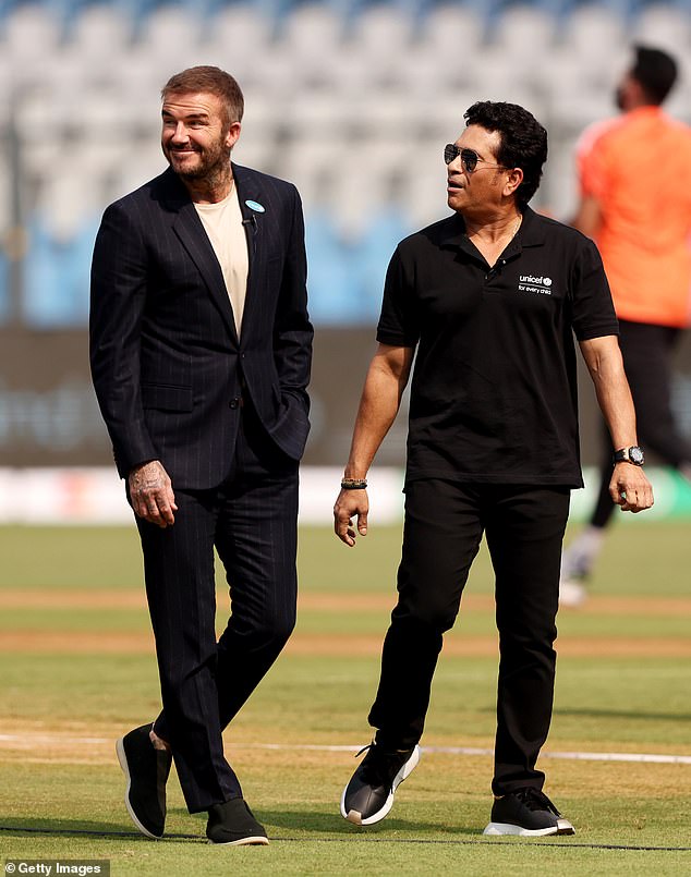 On the field: David with UNICEF Goodwill Ambassadors, Sachin Tendulkar