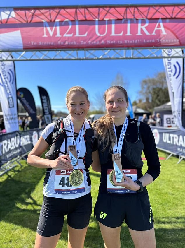 Zakrzewski (left) was disqualified from the 50-mile ultra-marathon from Manchester to Liverpool after accepting a lift from a friend during about 4 miles of the race