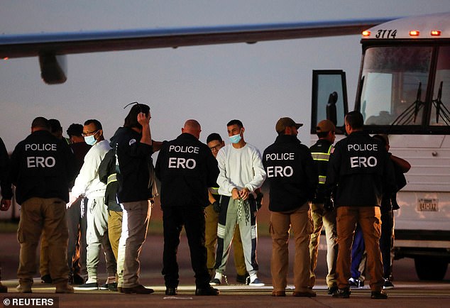 Venezuelan migrants are searched before boarding a repatriation flight as part of an immigration enforcement process at Valley International Airport in Harlingen, Texas