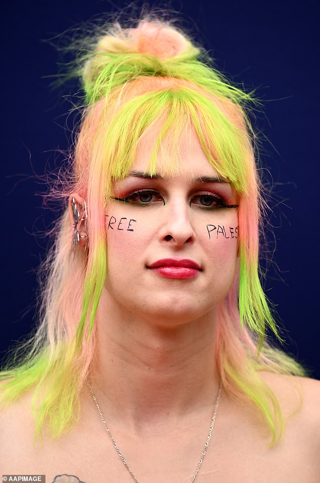 The words 'Free Palestine' were written on Milla's cheeks