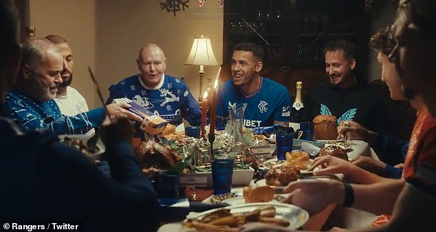 Icon: The 56-year-old midfielder joined old and new teammates for a very festive Christmas dinner