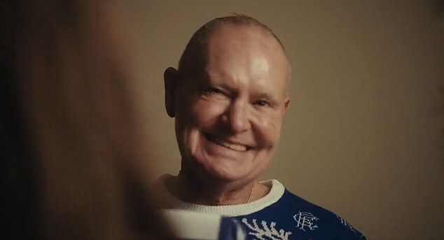 Classic: Gazza flashed a cheeky smile as his shocked appearance was revealed