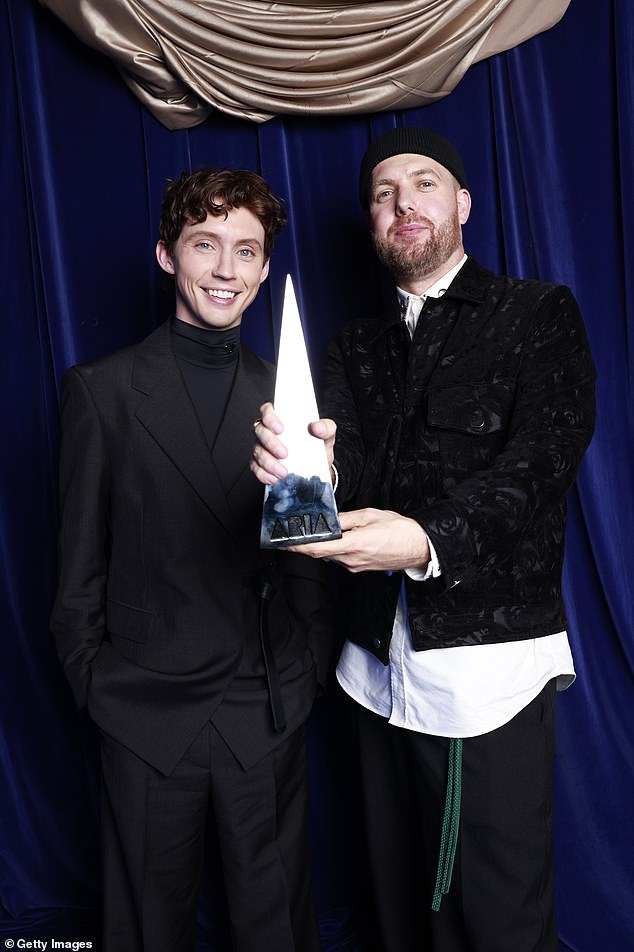 He also took home the awards for Best Engineered Release and Best Produced Release, which were accepted by his producer Styalz Fuego (right)