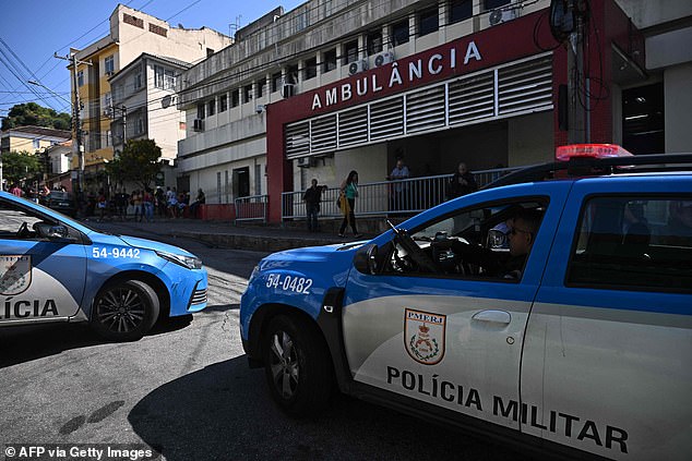 Rio's northern zone is the scene of frequent and violent clashes between police and drug gangs battling for territorial control.  Pictured: Rio de Janeiro military police in Penha, 2023