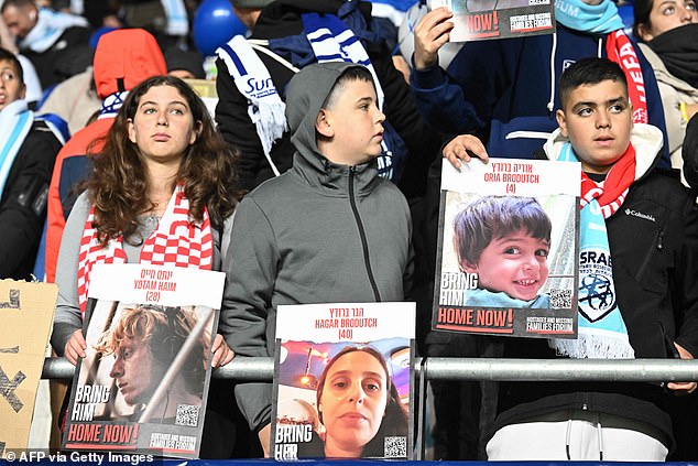 Fans held up banners during their clash with Switzerland asking for kidnapped supporters to be brought home