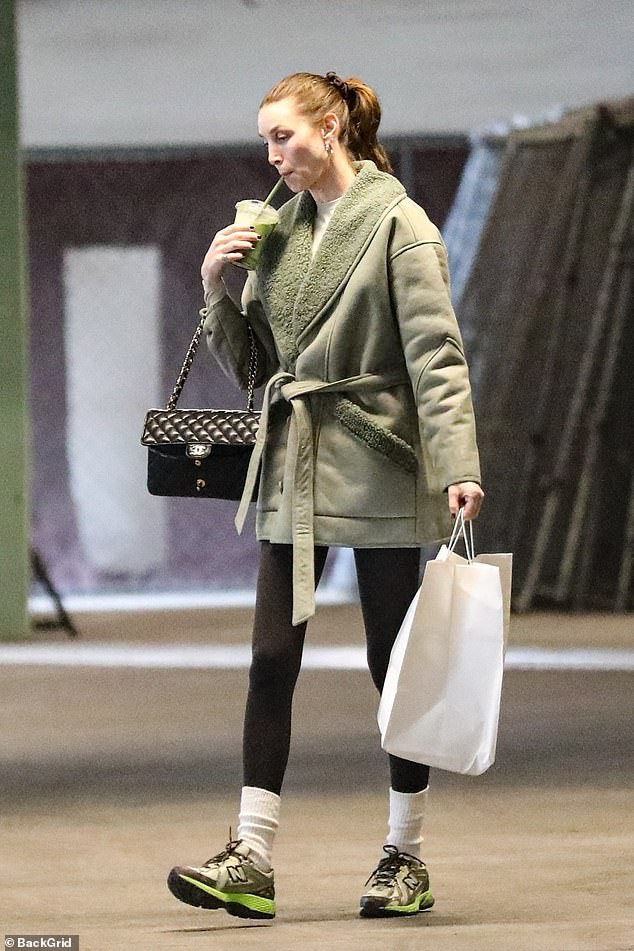 Chic: The Hills star, 38, braved the chilly fall weather as she dressed up in a chic mint green coat with a cozy collar during a visit to the Pacific Design Center