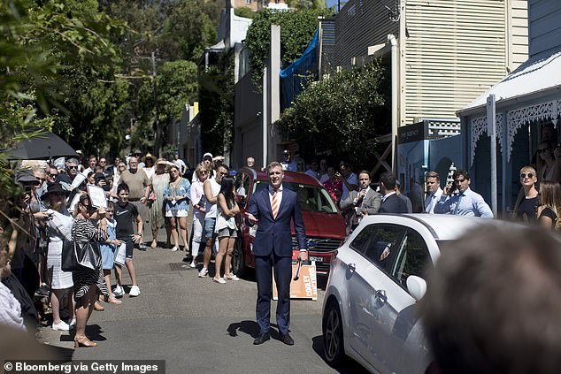 The One Nations Leader also urged Australians to let go of the 'Australian dream' of owning a home (pictured, auction in Paddington, Sydney)