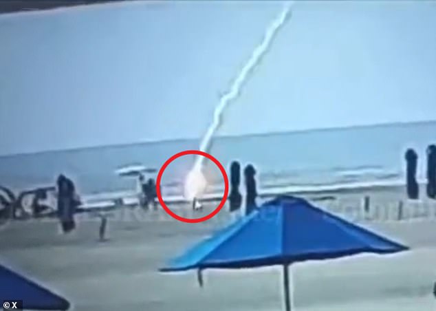 A bystander captured the moment lightning struck Froilanis Rivas on a beach in Cartagena, Colombia, on Tuesday