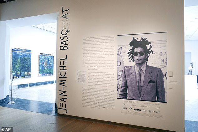 De Groft had personally championed and supervised the OMA's Basquiat exhibition, entitled Heroes & Monsters.  The entrance to the exhibition can be seen above