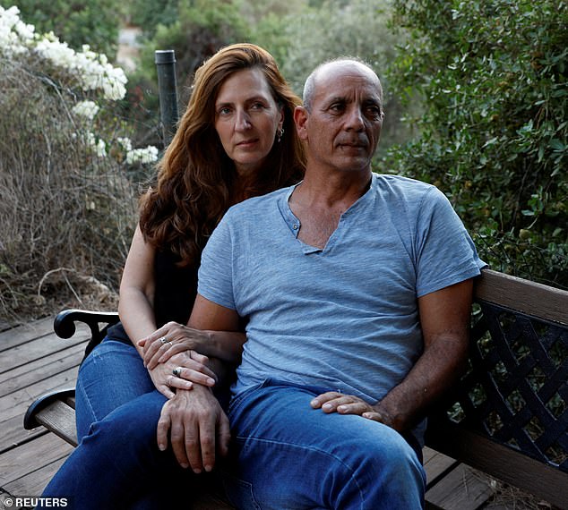 Nissim and Ricarda Louk, the parents of Shani Louk, 22, were photographed last Tuesday at their home in Srigim-Li On, Israel