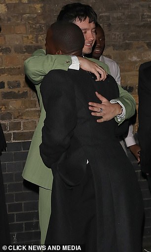 Pals: The pair were seen hugging and catching up as they tried to enter the lavish club around 2.30am after leaving the Royal Opera House in London