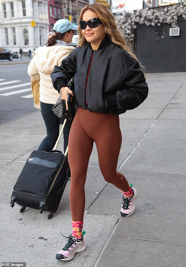 Impressive: Her tight leggings showed off the singer's toned body, which she apparently works hard to maintain