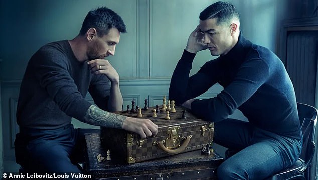 'Victory is a State of Mind': The biracial hip-hop stars recreated a famous photo of football stars Lionel Messi and Cristiano Ronaldo playing chess, which was photographed a year ago by Annie Leibovitz as part of their paid partnership with Louis Vuitton