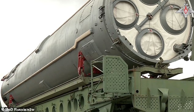 Video shows the rocket being slowly loaded onto a tanker en route to a launch site