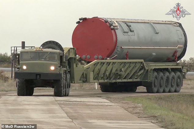 A convoy of armed vehicles was seen leading the nuclear-capable missile to a launch site