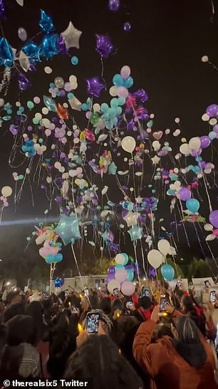 Hundreds of balloons were released and numerous portraits of Mallory were on display