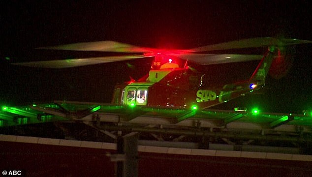 Two SA Police officers and an armed suspect were shot during a late-night incident near the Victorian border.  In the photo, a medical rescue helicopter is on site