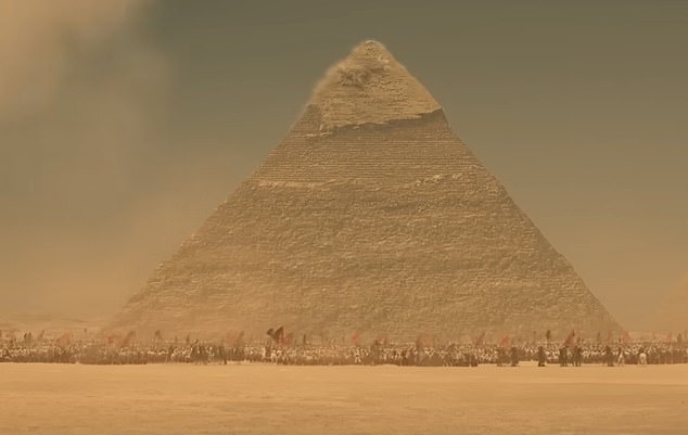 Historian Dan Snow elaborated on the scene in a TikTok analysis.  Above: The moment cannon fire hits one of the pyramids