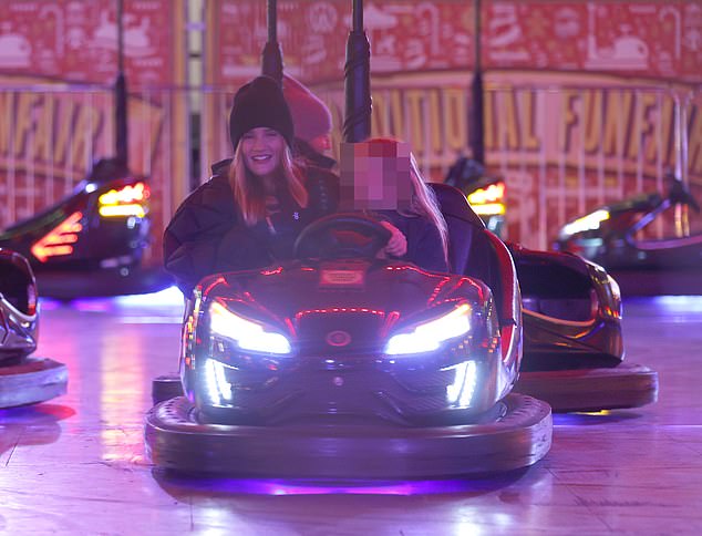 Walking in a winter wonderland!  The A-list couple attended the press night for the Christmas pageant and could be seen having a great time in the bumper cars with their son Jack, aged five.