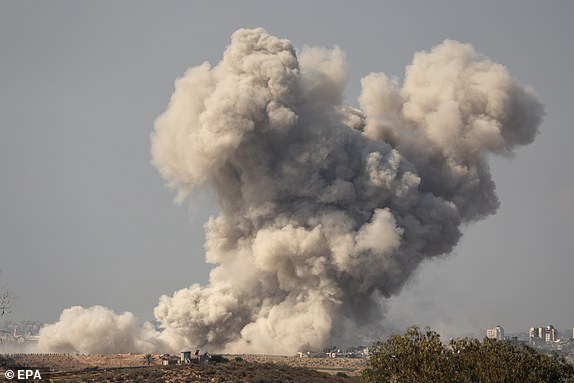 epa10980249 Smoke rises after an Israeli airstrike on the city of Beit Hanoun, in the northern Gaza Strip, as seen from the Israeli city of Sderot, southern Israel, November 17, 2023. More than 11,000 Palestinians and at least 1,200 Israelis have been killed.  according to the Israel Defense Forces (IDF) and the Palestinian Health Authority, since Hamas militants launched an attack on Israel from the Gaza Strip on October 7, and the Israeli operations in Gaza and the West Bank that followed.  EPA/ATEF SAFADI