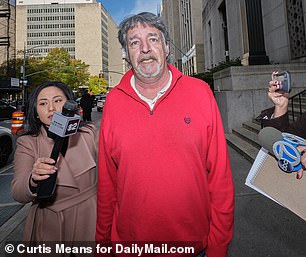 McKeever was flanked by reporters outside the Manhattan Criminal Court