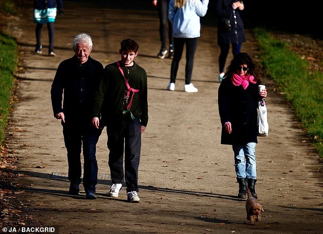 Showing their stuff: The family walked along as the evening arrived