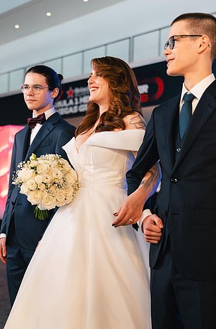 His partner Giulia wore a beautiful white dress for the wedding