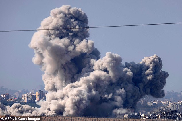 A photo taken from the Israeli side of the border with the Gaza Strip shows clouds of smoke during the Israeli bombardment of the Palestinian enclave on November 17, 2023