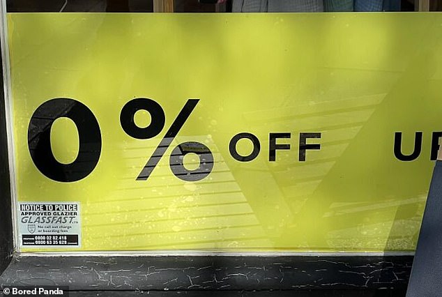 Deal of the day!  An unfortunately clipped sign in a shop window appeared to advertise a 0% discount on the products