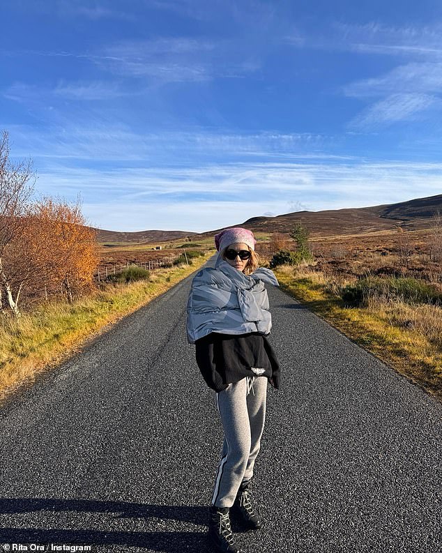 Fashionista: In one fell swoop, she was standing in the middle of the road, surrounded by wild terrain with hills in the distance