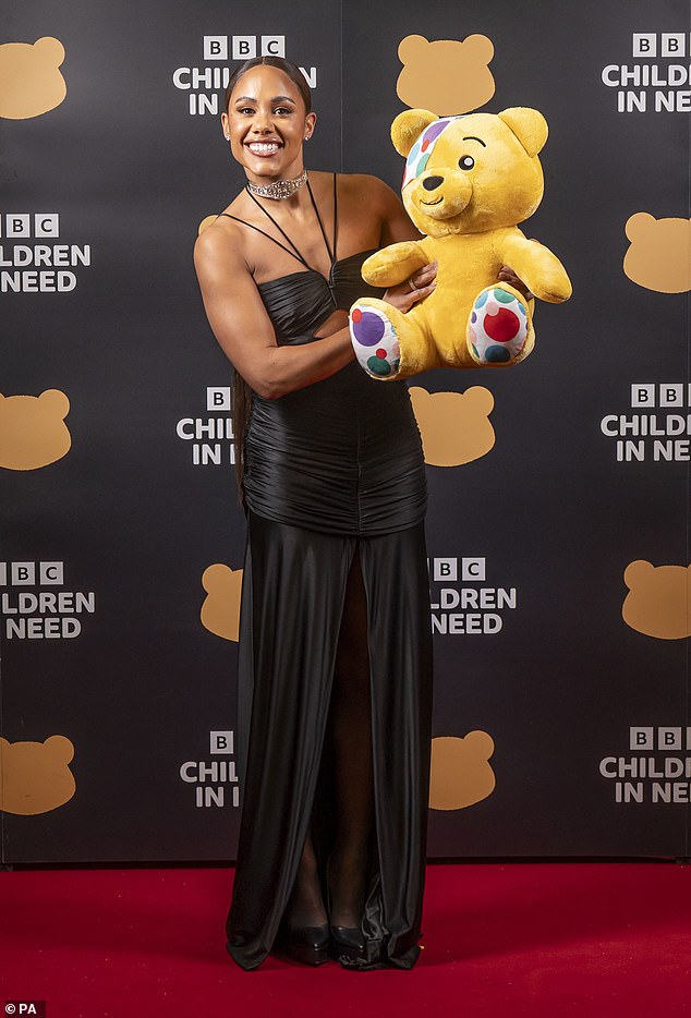 Fundraiser: Children In Need is expected to raise over £35 million this year.  Alex is pictured with Pudsey Bear, the Children In Need mascot
