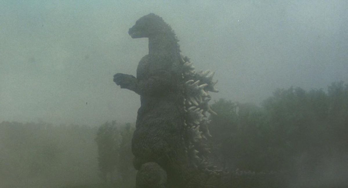 A shot of Godzilla standing in a still from Godzilla vs King Ghidorah