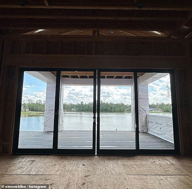 The last photo she shared was of her sliding glass doors that showed off a beautiful view of the lake behind their home