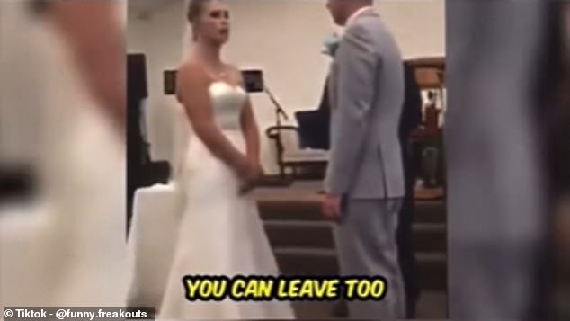 The 31-second footage showed the bride and groom standing opposite each other at the altar, midway through exchanging vows as the bride read from a sheet of paper.