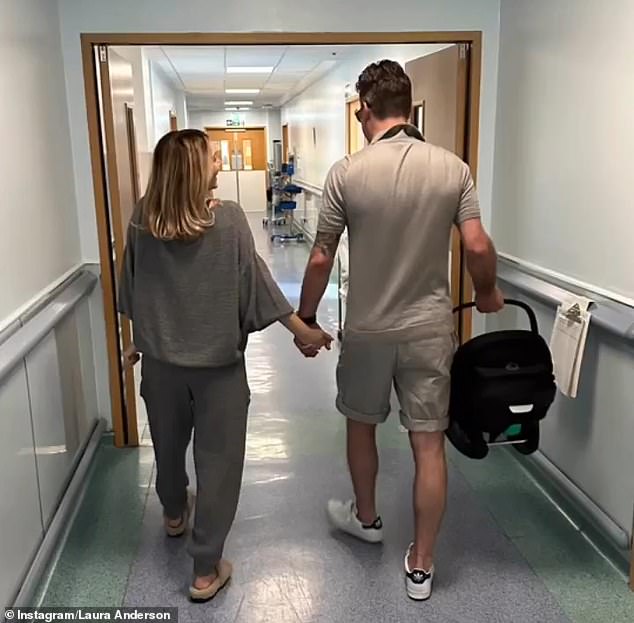 Together again?  Laura shared a photo of her and Gary holding hands as they left the hospital with Bonnie