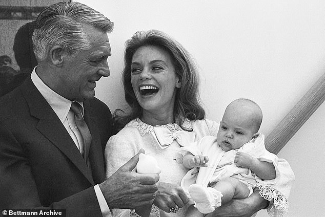 Cary Grant and wife Dyan Cannon, and their daughter Jennifer, three months old, moments before boarding the SS Oriana en route to England to visit Grant's mother