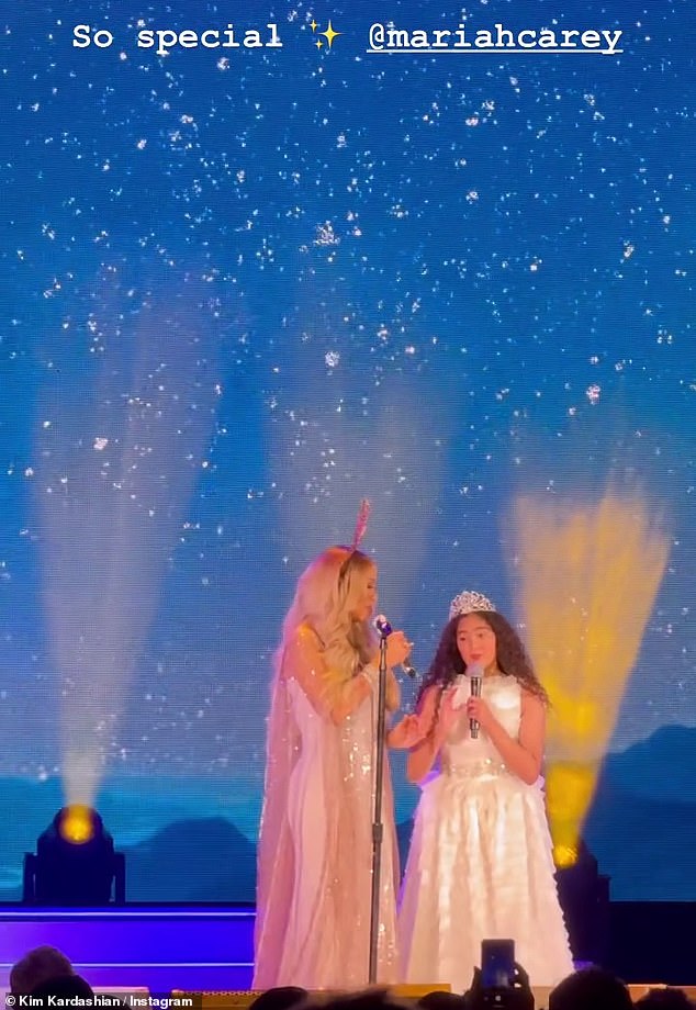 Duet: Mariah Carey, 54, brought her daughter Monroe, 12, on stage for a duet of her 1994 hit Jesus Born on This Day
