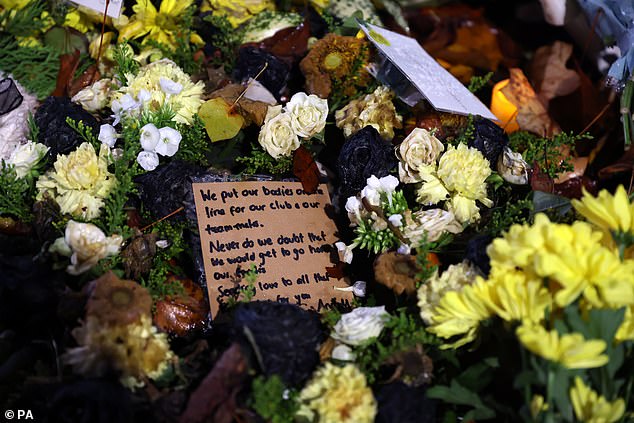 Emotional and moving personal messages were attached to many flowers as people paid their respects