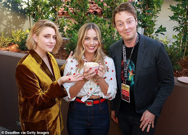 Making memories: She enjoyed posing with Gerwig and media personality Michael Breach, who is known for his latte art