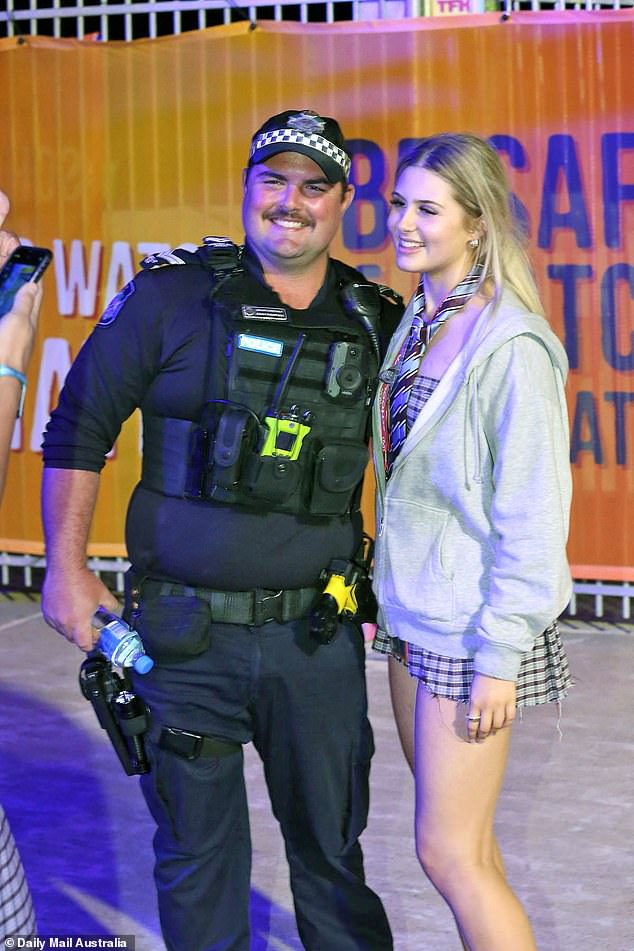 Having your picture taken with a police officer (photo) is a right of passage for many schoolmates