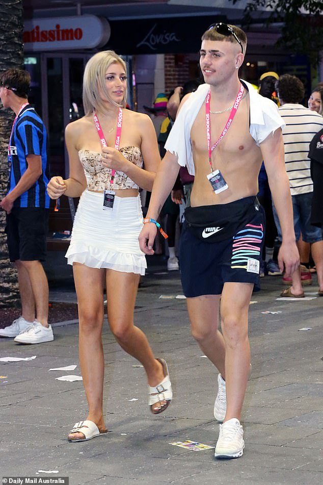 This young couple appears to be wondering where they will go on their night out in Surfers Paradise