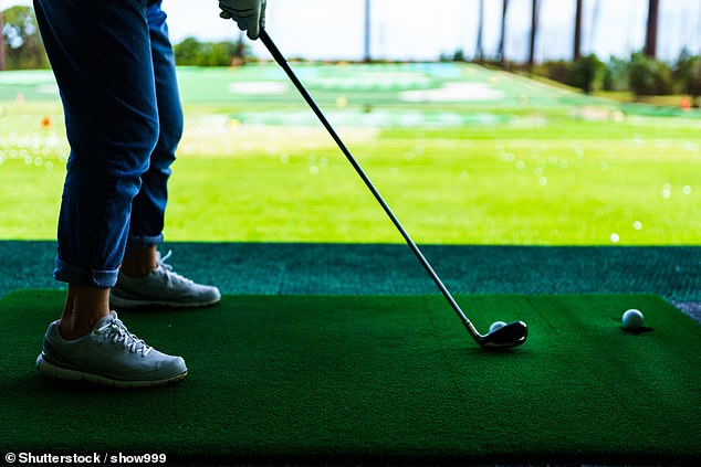 The club has a strict dress code and details the items banned on the green, including any blue denim clothing (stock photo of a person wearing jeans on the driving range)