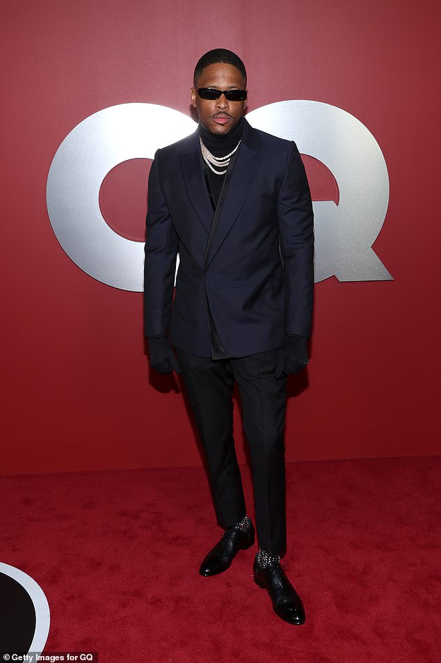 Staying busy: Filtering through a busy schedule, YG recently dressed to impress in an all-black ensemble while attending the GQ Men of the Year Party earlier on Thursday in Los Angeles