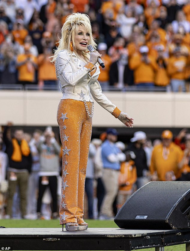 Tune: The 77-year-old country music icon — who just released her album Rockstar — led a rendition of the song Rocky Top after the first quarter of the game, according to Knox News