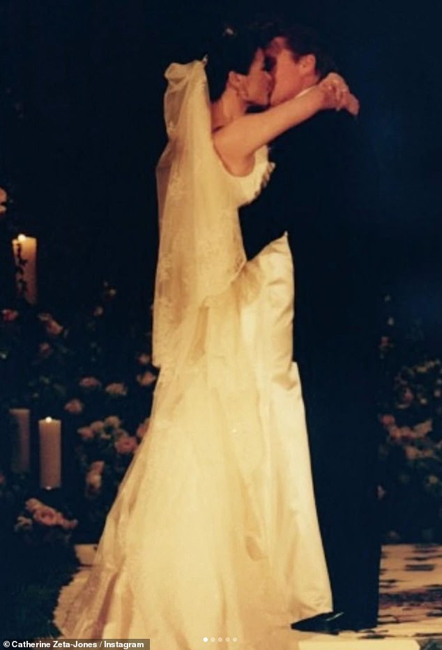 Love: One image showed them kissing during their ceremony at The Plaza in New York City in the year 2000