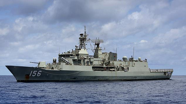 Australian Navy divers were forced to leave waters off Japan after a Chinese destroyer allegedly came too close and activated its hull-mounted sonar