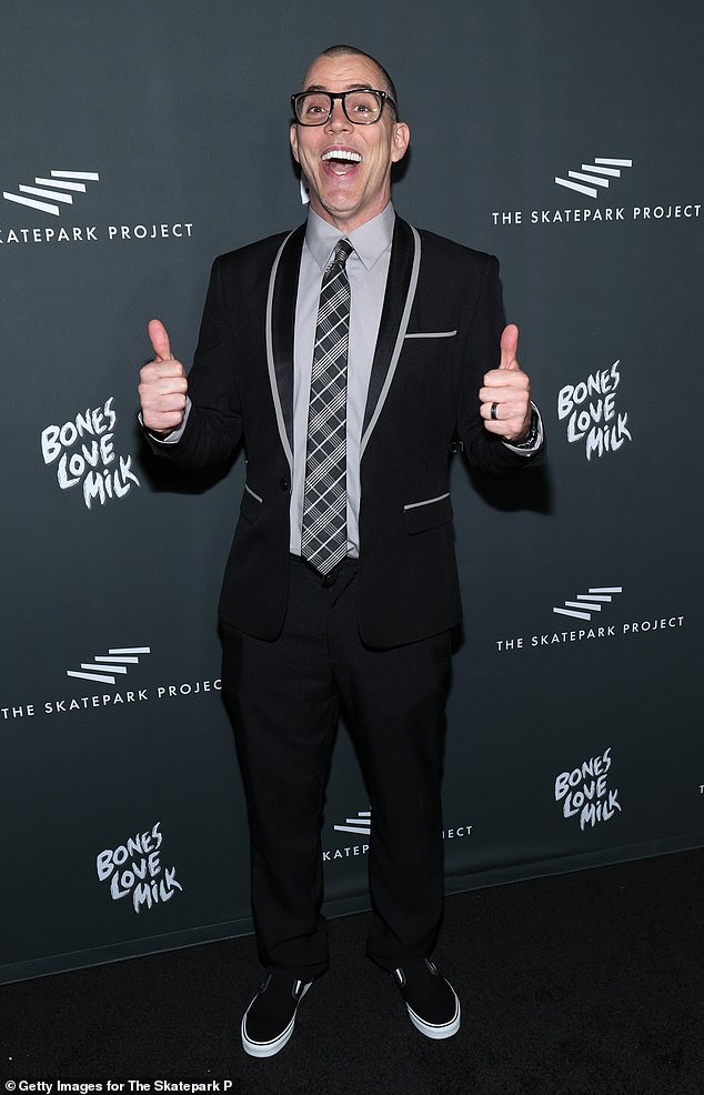 The Wildboyz star, 49, dressed to impress at the gala in black trousers, a retro black and gray blazer, a matching shirt and tie, and black sneakers.