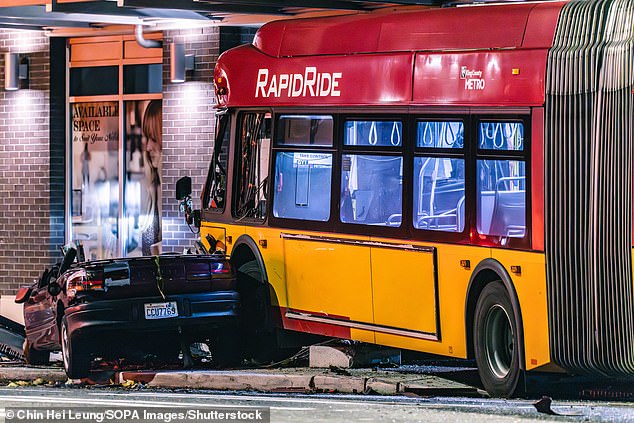 On the left you can see the car Abelson was driving as the bus ended up on the sidewalk