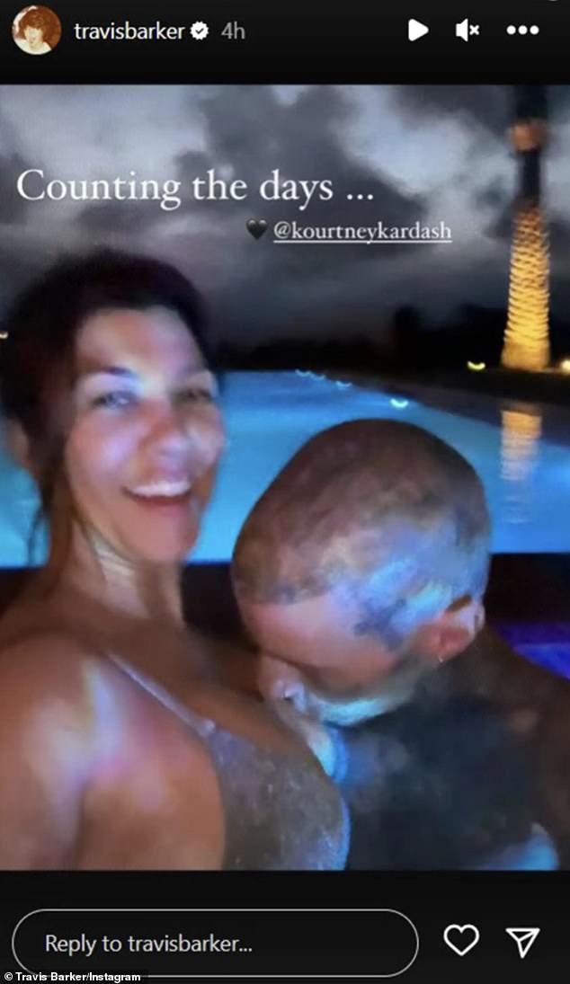 Sealed with a kiss!  Travis shared a photo of him kissing Kourtney's cleavage in a steamy photo of them hanging out by the pool