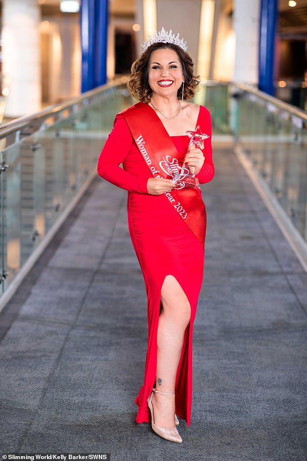 She has been named Slimming World's Woman of the Year 2023 for her incredible weight loss journey (Pictured: Kelly after her weight loss with the Slimming World award)